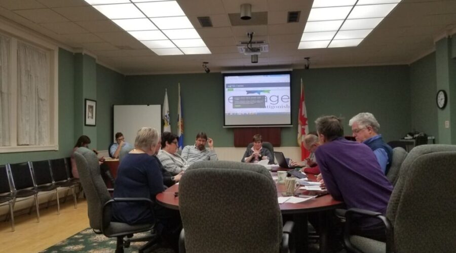 Municipal officials and volunteers wait for cold weather for outdoor rink