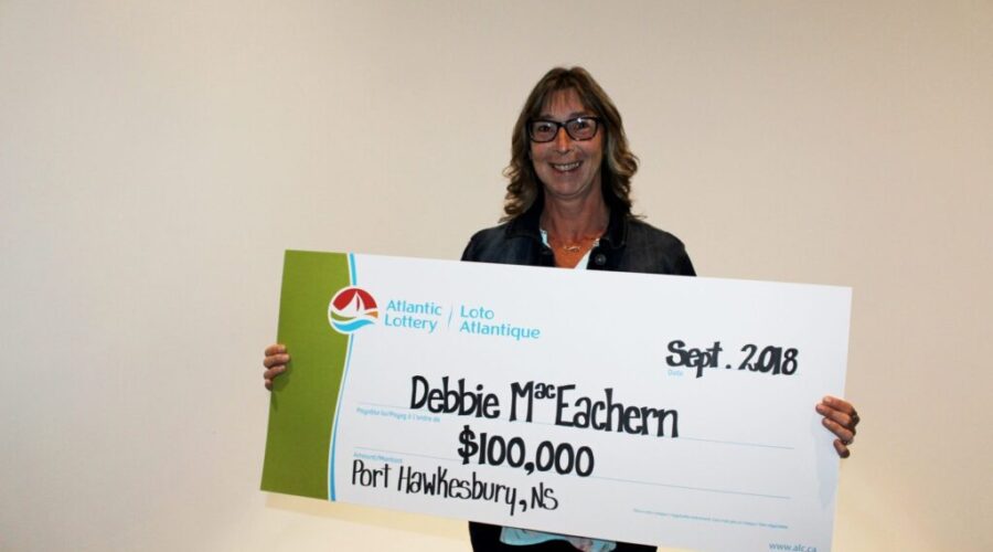 Local lotto winner claims prize