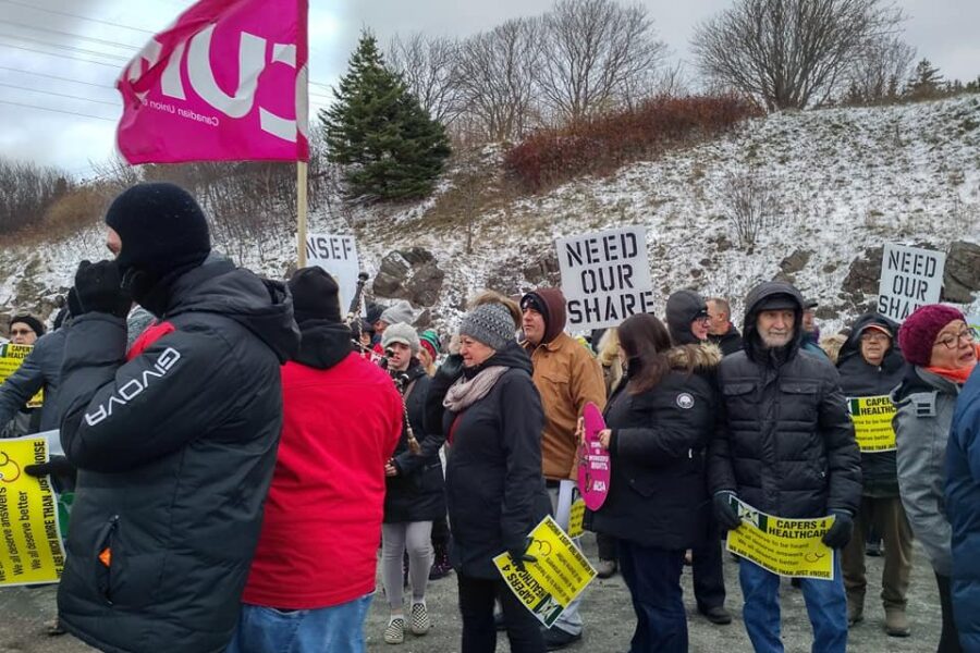 Roughly 200 people take part in health care march across Canso Causeway