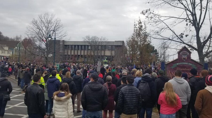 People gather for Remembrance Day ceremonies in Quad Counties