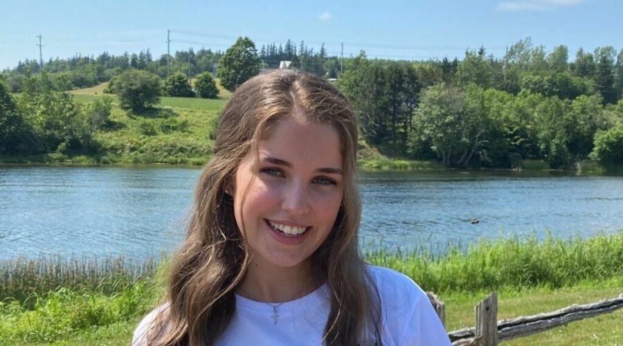 StFX student helping adults with special needs