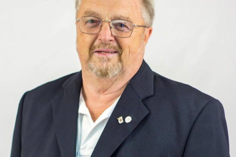 Cotter carrying Conservative banner in Central Nova