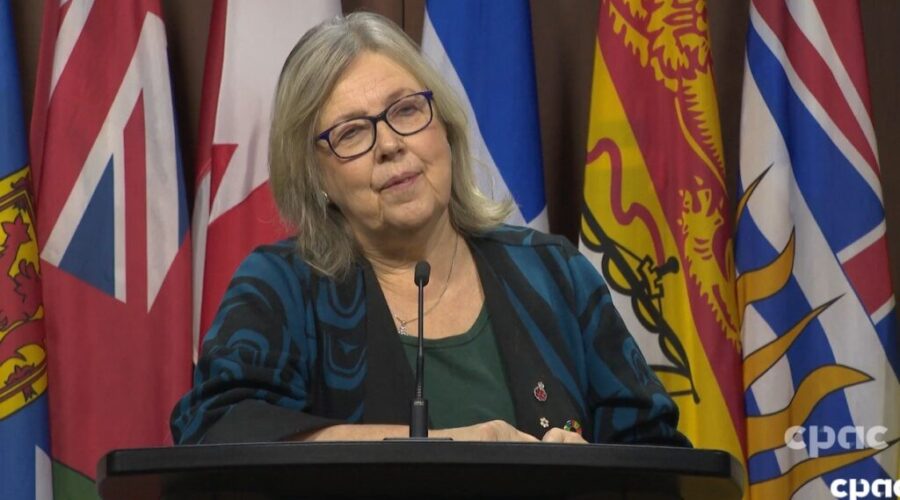 May encourages united front in dealing with Trump