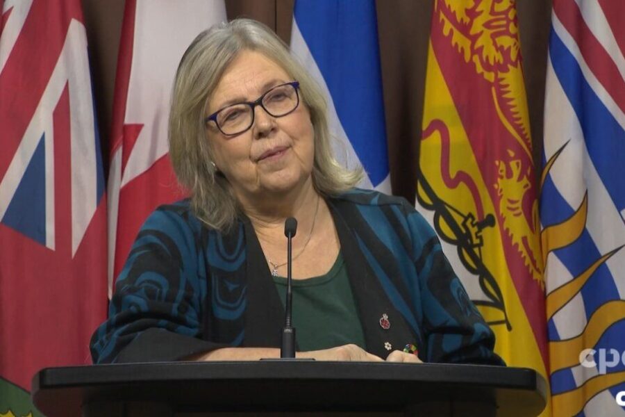 May encourages united front in dealing with Trump