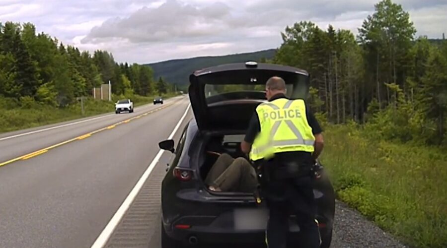 Two men face charges after one rode in back of open hatchback on Cape Breton highway