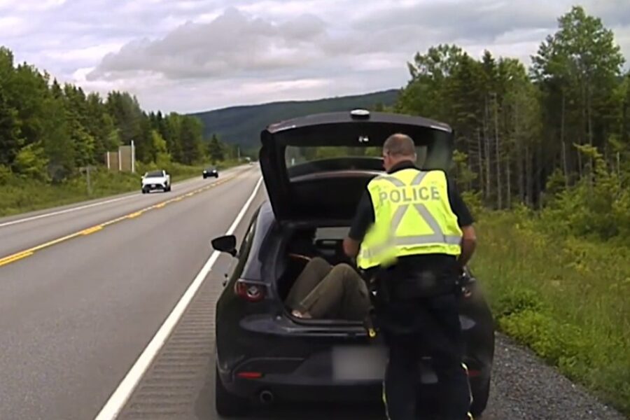 Two men face charges after one rode in back of open hatchback on Cape Breton highway